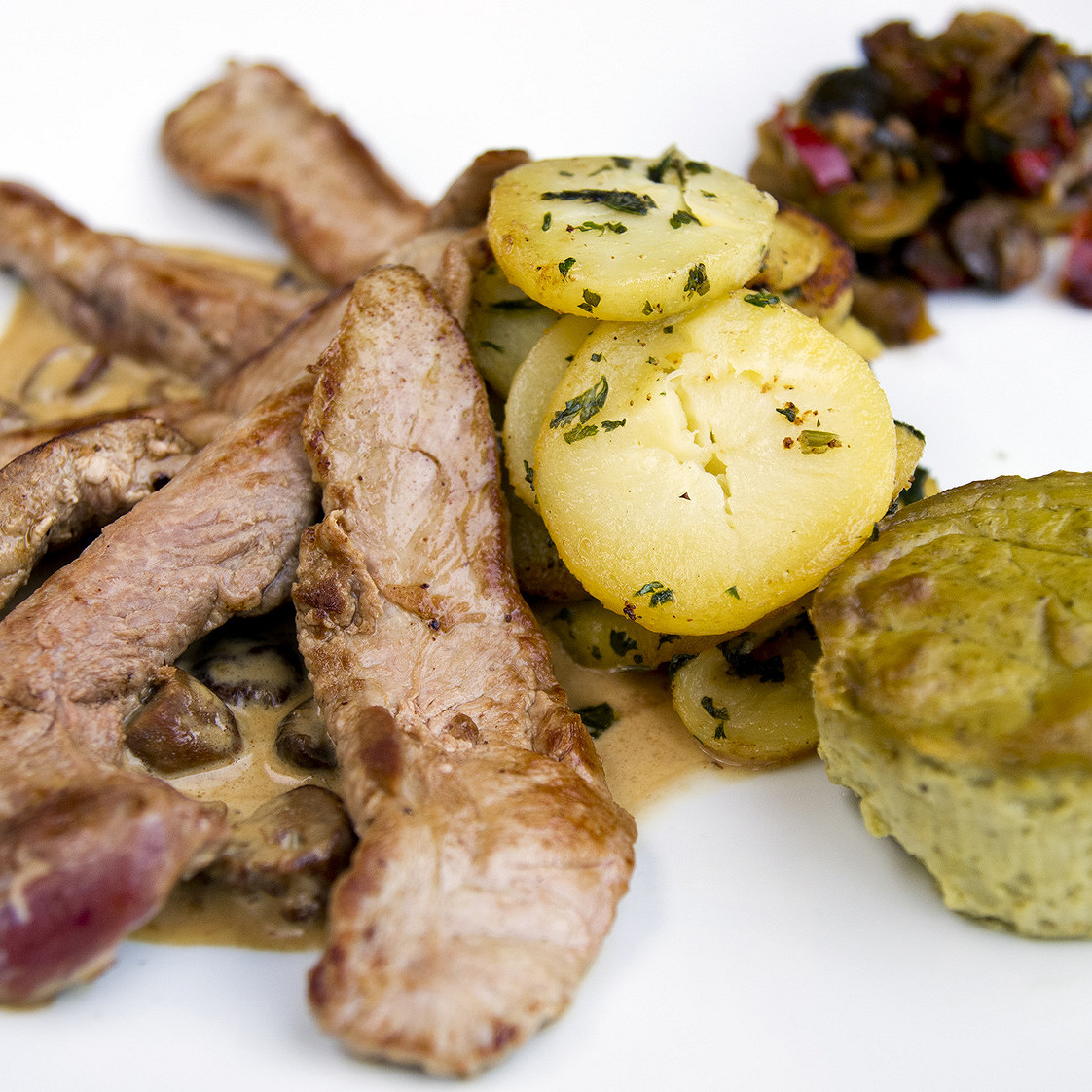 Aiguillettes de canard aux champignons